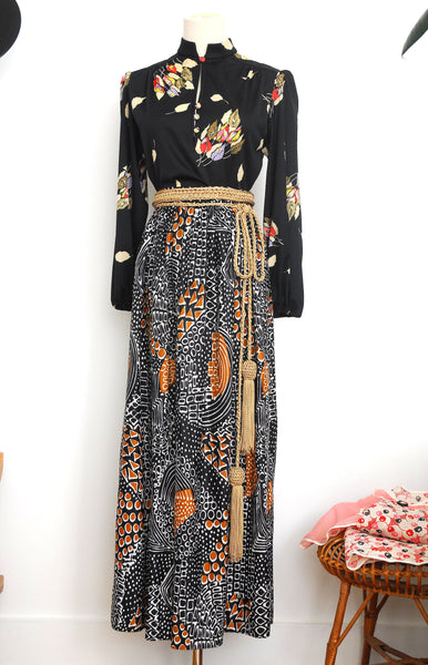 sale | Black & Gold Print Maxi Skirt / 1970s